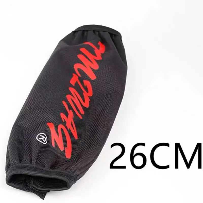 Black waterproof shock absorber cover with red lettering on a dirt bike or ATV part.