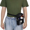 A person wearing a dark green t-shirt and light blue jeans is holding a black multi-pocket crossbody fanny pack.