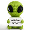 Handmade crochet green frog doll with a white card that reads You're the best thing I've ever found on Earth