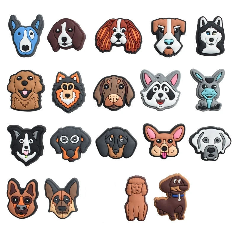 A collection of various dog-themed PVC pins and charms featuring different breeds and expressions.