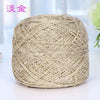A ball of metallic silver shimmer crochet yarn used for knitting and macrame.