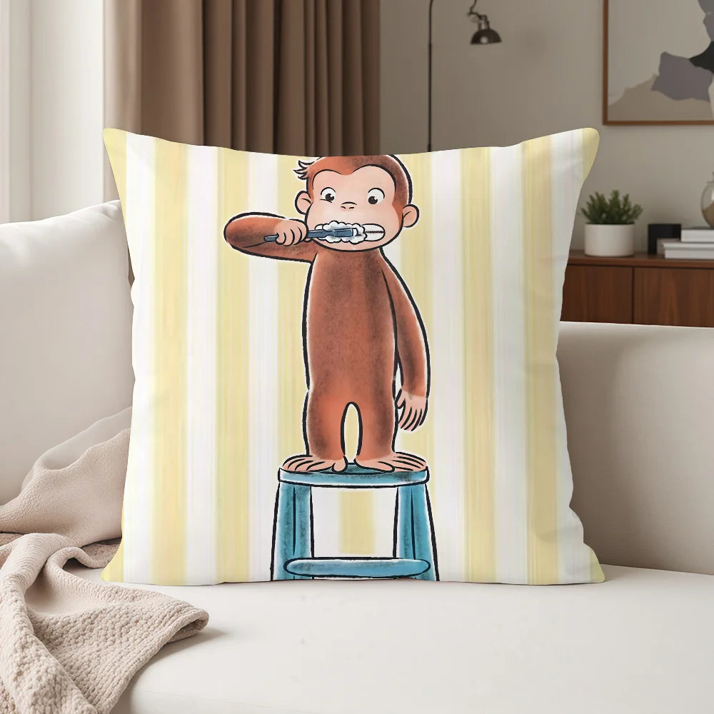A cartoon illustration of Curious George standing on a pedestal, printed on a striped pillowcase.