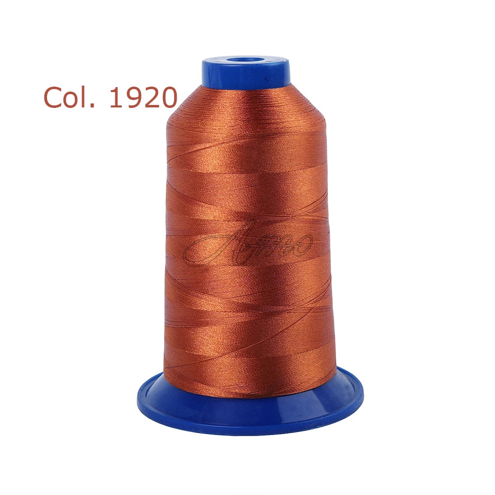 A spool of orange embroidery thread labeled Col. 1920