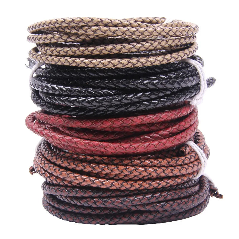 A stack of genuine braided leather cord in various shades of brown and black for jewelry making