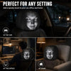 Two black ghost face headrest covers shown in contexts: in a car, at an office, and at home.
