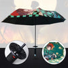 A folding umbrella featuring a Demon Slayer theme with a character design and a checkered pattern.