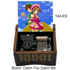 A wooden music box featuring a cardcaptor sakura theme, with an illustration of Sakura Kinomoto and a yellow-gold color palet