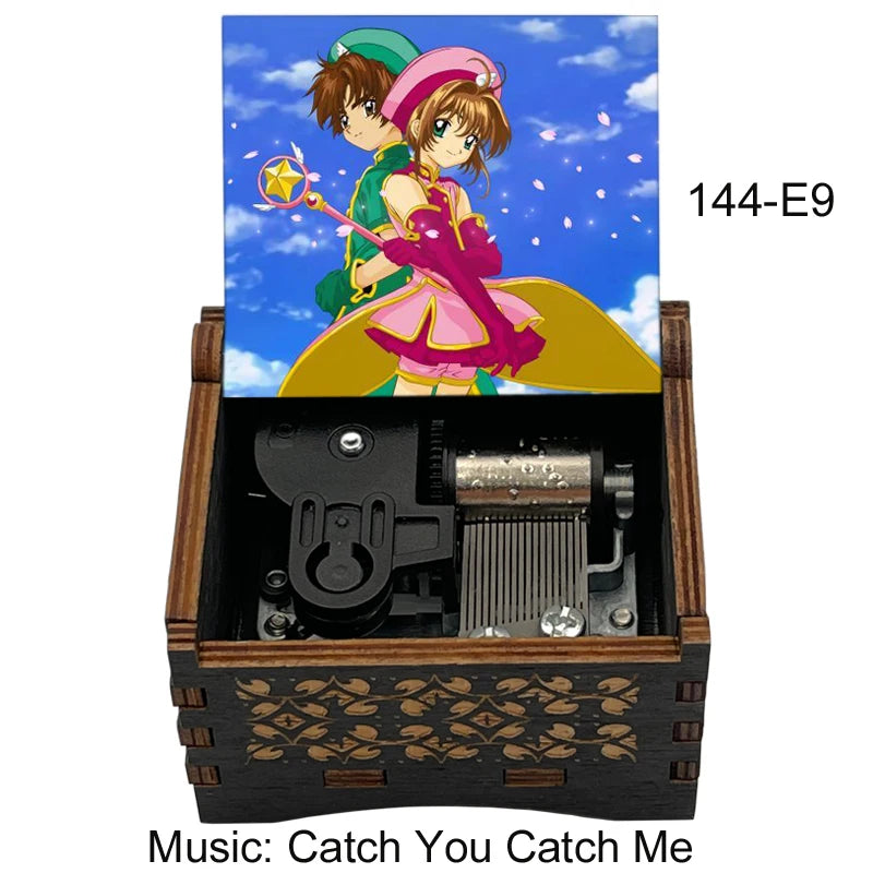 A wooden music box featuring a cardcaptor sakura theme, with an illustration of Sakura Kinomoto and a yellow-gold color palet