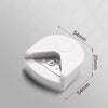 A white paper corner rounder cutter with dimensions marked, shown from a top-down angle.