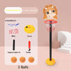 An adjustable kids basketball hoop with a cartoon design, featuring a red net, yellow chassis, and three basketballs.