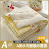A lightweight summer quilt with a playful cartoon print featuring yellow and green accents.