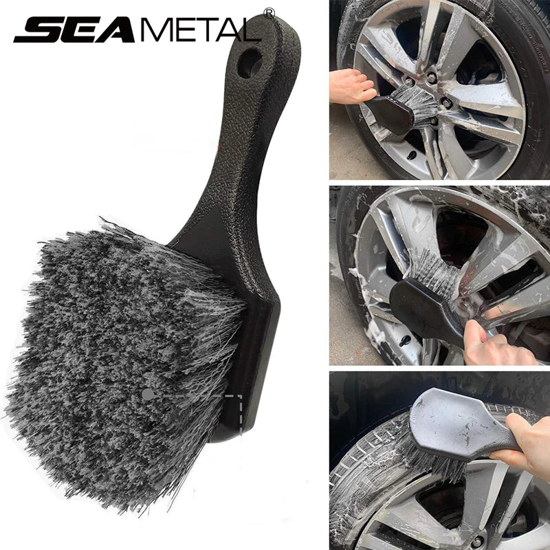 A black car cleaning brush set featuring a bristled brush and a glove for detailing wheels.