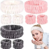 A collection of white and pink microfiber wrist sweatbands and scrunchies for face washing, shown next to a woman.