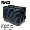 A stack of 32 modular drawer organizer trays in black, including small, medium, and large sizes.
