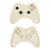 A beige silicone baby teether toy shaped like a remote control, featuring various colored buttons and a plus sign.