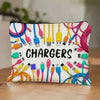 A zippered pouch filled with various electronic chargers and cables in colorful plastic connectors.