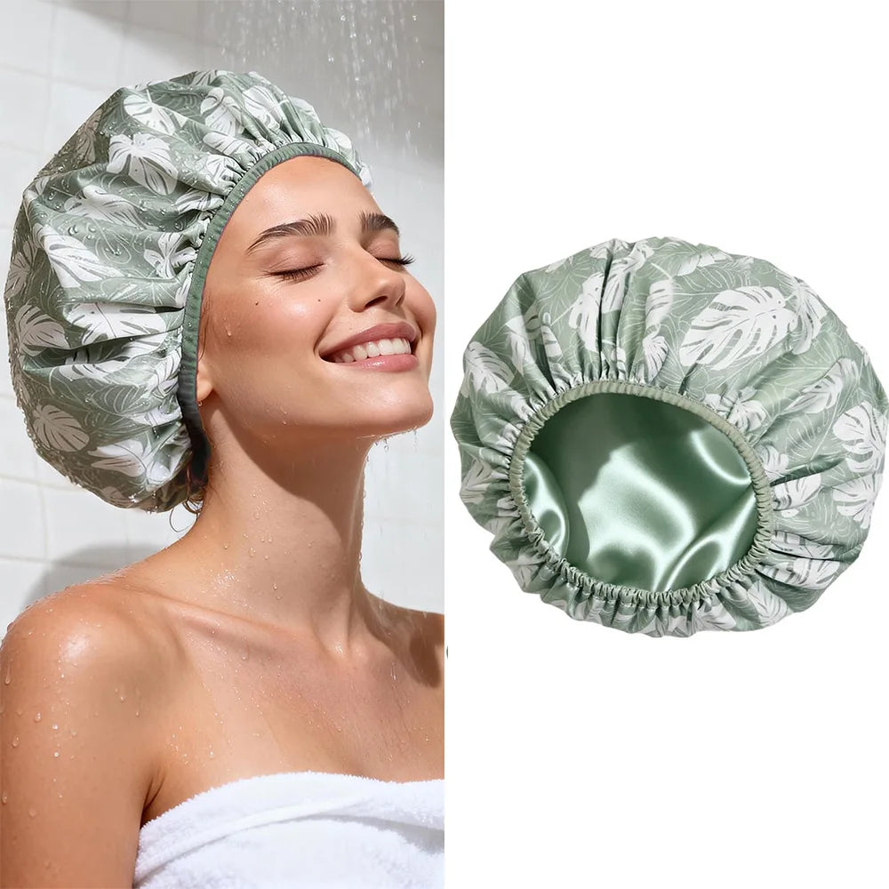 A close-up of a woman wearing a large, satin-lined waterproof shower cap for hair protection.