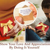 Hands present a set of red envelopes tied with gold ribbons and a note card for expressing love and appreciation.