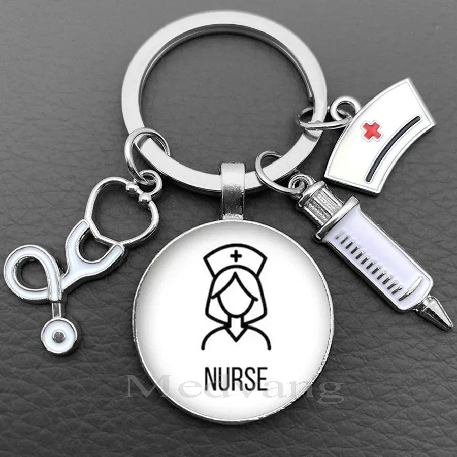 Silver keychain featuring a nurse symbol and a medical instrument, suitable as a nursing gift.