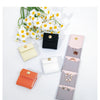 A collection of compact PU leather jewelry organizer pouches in various pastel and neutral colors, including black, cream, pi