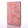 A pink retro marble case for an iPad Pro 12.9 with a built-in pencil holder.