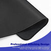 Black extended anti-slip desk pad with professional stitching design around the edges