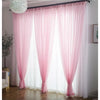 Three sheer pink voile curtains with rod pockets hanging in a bright room.