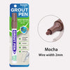 A tube of Grout Pen grout restorer in a purple casing with a mocha-colored applicator tip.