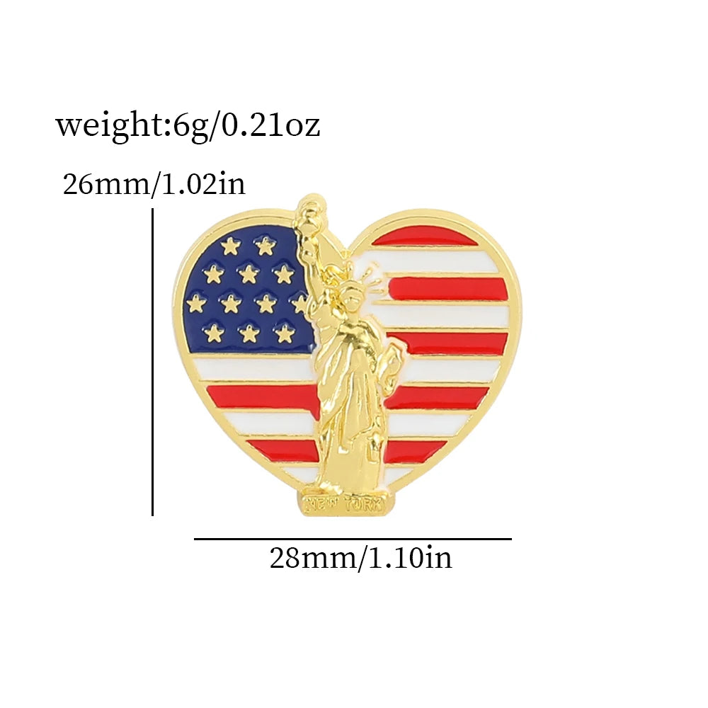 Gold enamel brooch pin shaped like a heart with an American flag design