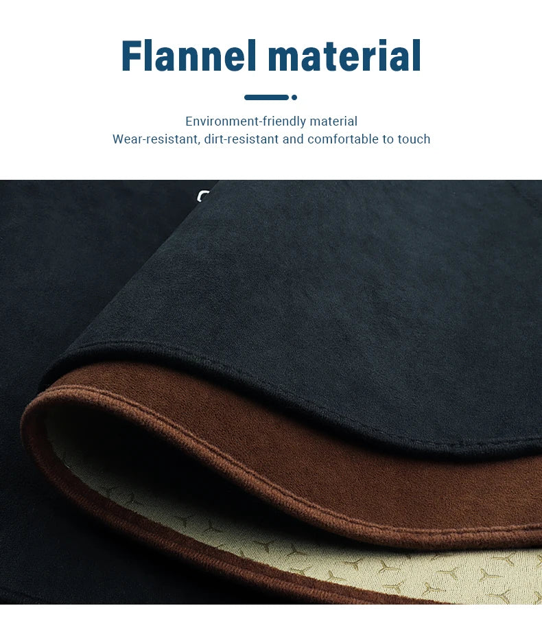 A close-up of a dark gray flannel material product rolled up, showing its texture and color variation.