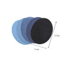 A stack of round cotton iron-on patches in various shades of blue and black, showing their size.