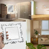 A silver switch cover frame with an elegant rose pattern design is shown against a white background.