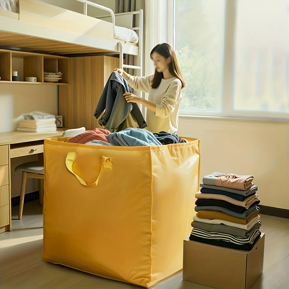 A woman is putting clothes into a yellow heavy-duty waterproof moving bag in a bright room.