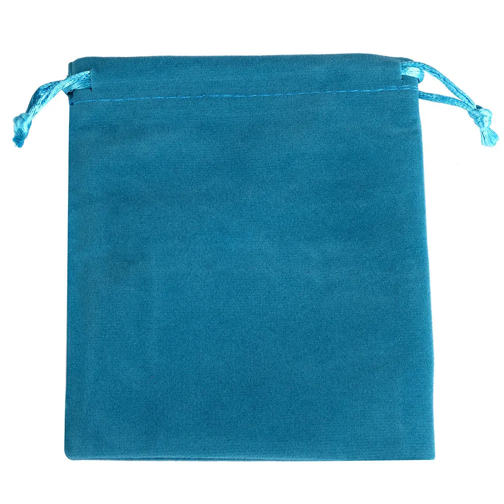 A teal velvet drawstring jewelry pouch with light blue ties.