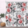 Floral fabric shower curtain featuring pink roses and dark green leaves on a white background
