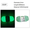 Green glow-in-the-dark polyester yarn with a black label, showing the diameter and length specifications.