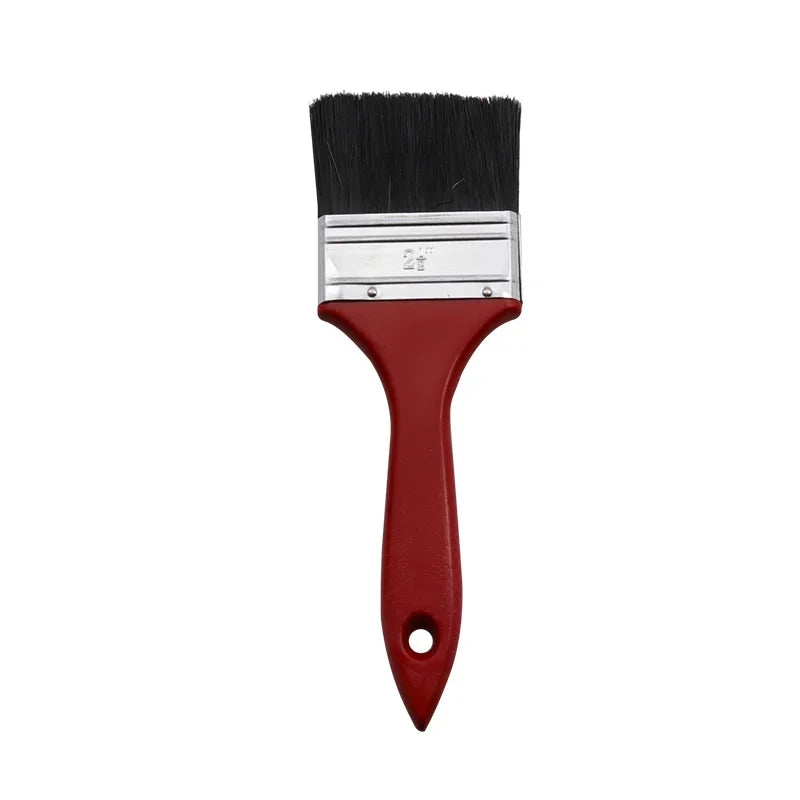 A black paint brush with a silver ferrule and a red plastic handle.