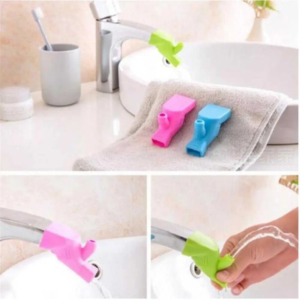 Flexible silicone faucet extenders in pink, blue, and green colors used for handwashing.
