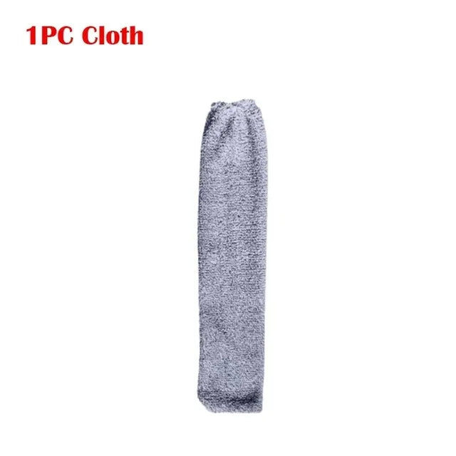 A single piece of gray microfiber cloth rolled into a cylindrical shape.