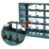 A close-up view of a wall-mounted parts organizer with multiple drawers and compartments in a teal color.