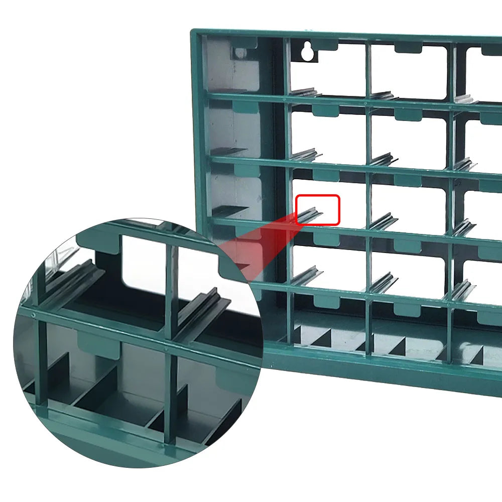 A close-up view of a wall-mounted parts organizer with multiple drawers and compartments in a teal color.