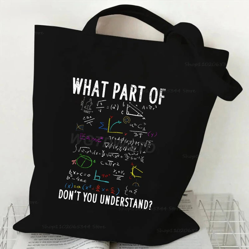Black canvas tote bag featuring the text WHAT PART OF DON'T YOU UNDERSTAND?