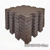 Eight interlocking foam play mats stacked in a square formation, brown color.