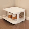 A white stackable vertical shoe rack with open shelving for storing shoes.
