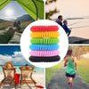A collection of ten colorful silicone bracelets for mosquito repellent, stacked in various shades of red, yellow, green, blue