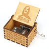 A wooden music box with a lid featuring a profile of a woman and the text CIAO BELLA