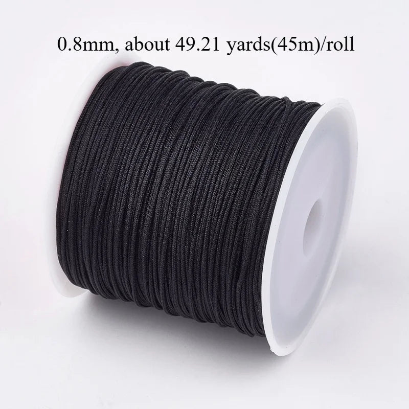 A roll of 0.8mm black nylon cord for jewelry making and crafting, measuring about 49.21 yards per roll.
