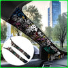 A close-up view of a graffiti pattern velvet car interior wrap sticker applied to the side of a vehicle.