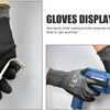 Black work gloves with a sandy nitrile coating being used to grip a metal tool.