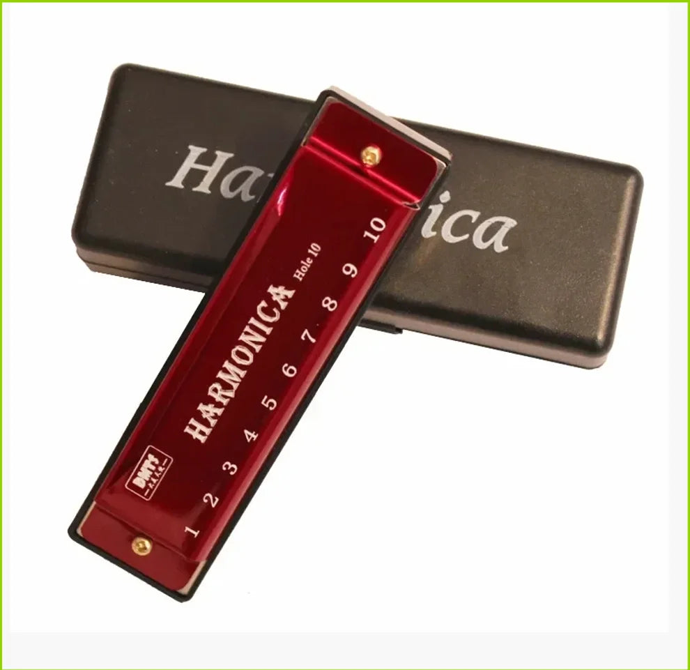 A red harmonica with numbered holes is shown inside its protective black case.